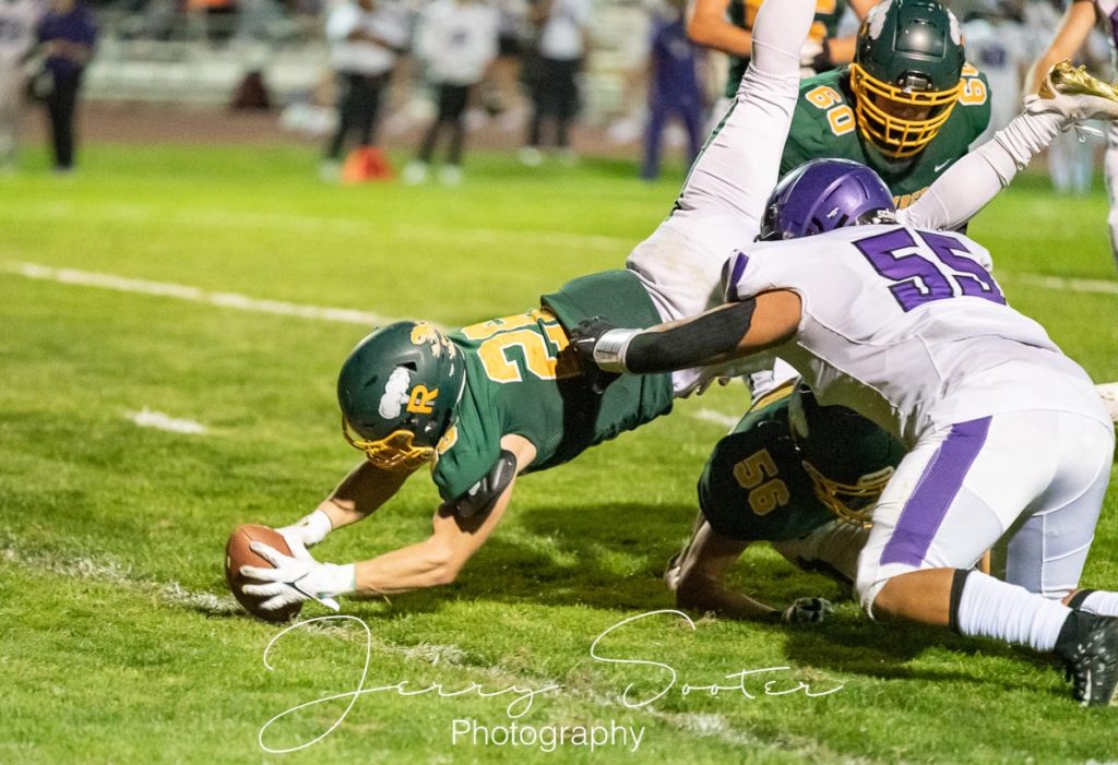 High School football flying to a first down